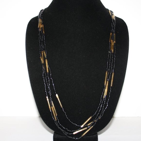 Multi strand black and gold glass bead necklace